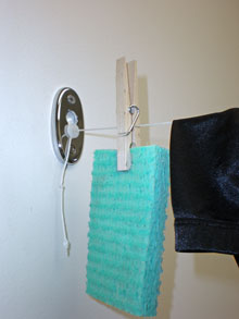 Pull-out end of retractable clothes dryer line