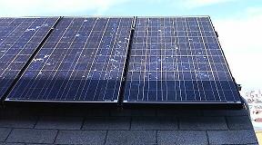 two SX170B 170 W solar panels on roof