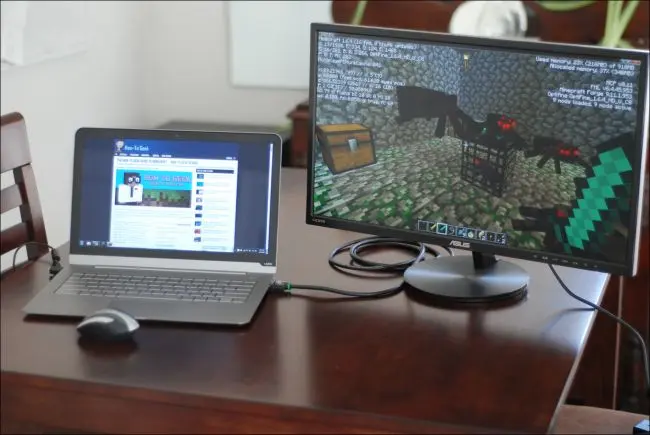 monitor awkwardly placed to side of laptop