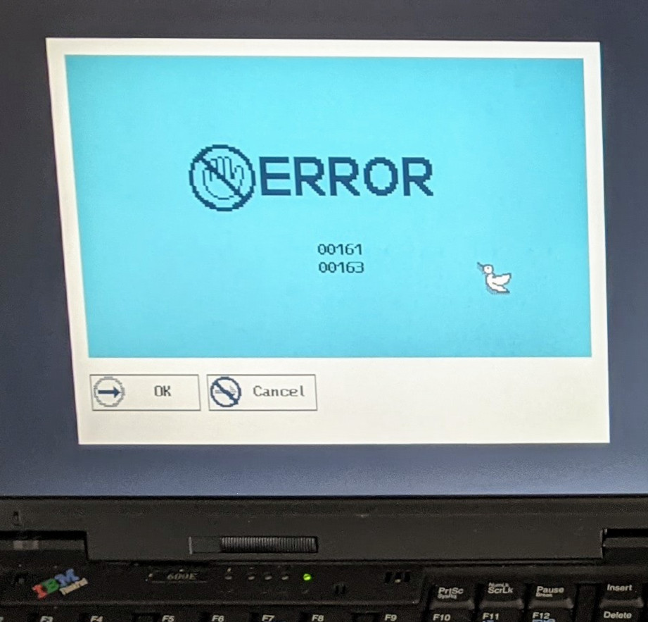 screen showing BIOS error and flappy bird cursor