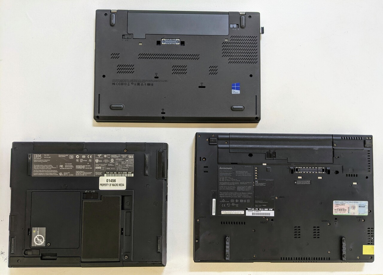 undersides of Thinkpad T460, Thinkpad 600E, and Thinkpad T61